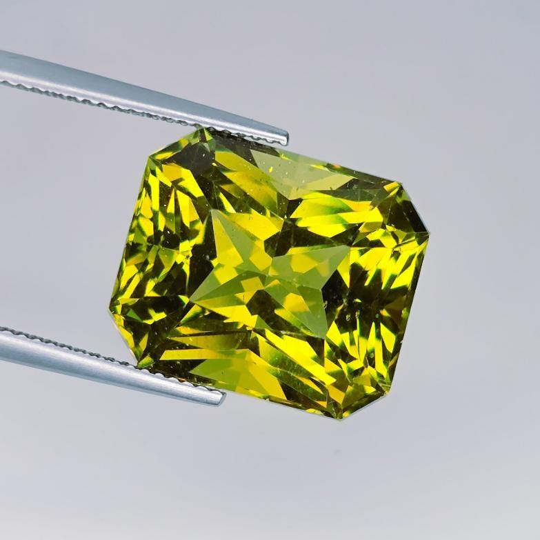 Natural Yellow Green Apatite 23.07 Ct – IGI Certified – Bright Lemon Green – Large Cornered Rectangular